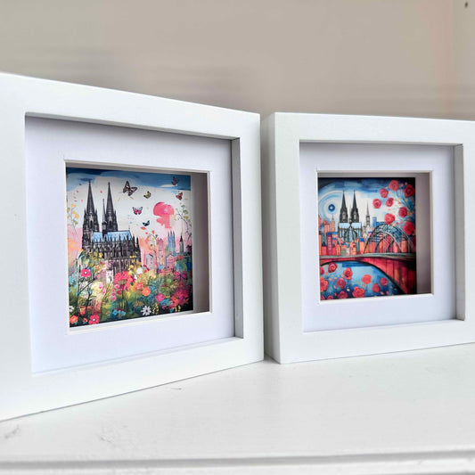 2er-Set: Kölner-Blumenbilder „Dom“ und „Skyline“ (gerahmt, 10x10cm)